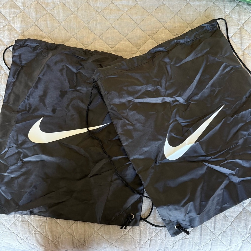 Nike | Two (2) Drawstring Backpacks